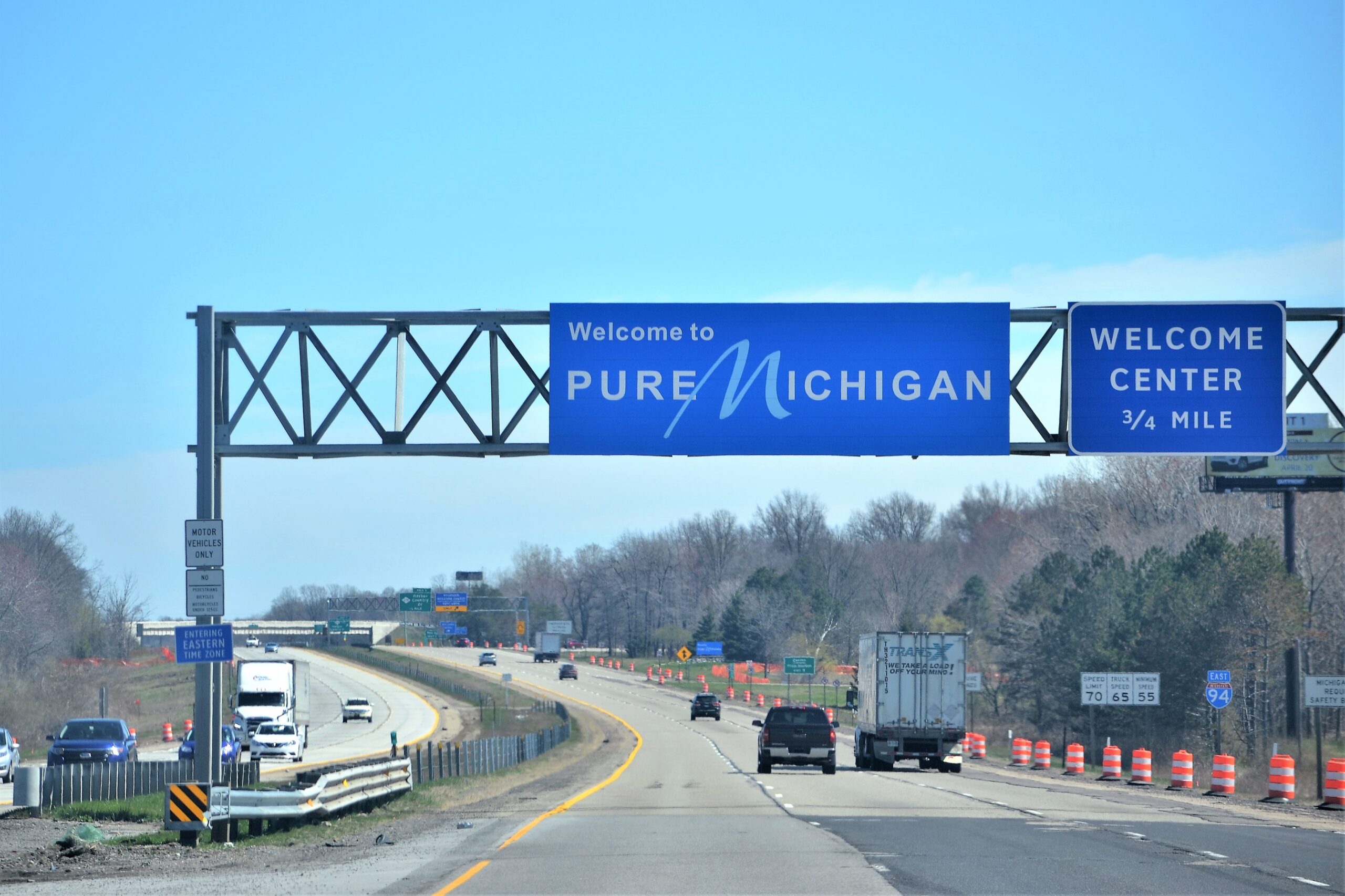traveling-on-the-interstate-with-road-signs-welcom-2025-01-08-20-40-18-utc